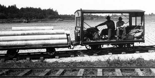Cranguyma Farms rail cart hauling pipe for its sprinkler irrigation system